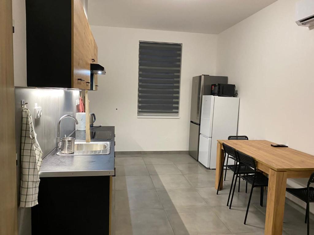 Kuchyň nebo kuchyňský kout v ubytování Apartmány Kortan