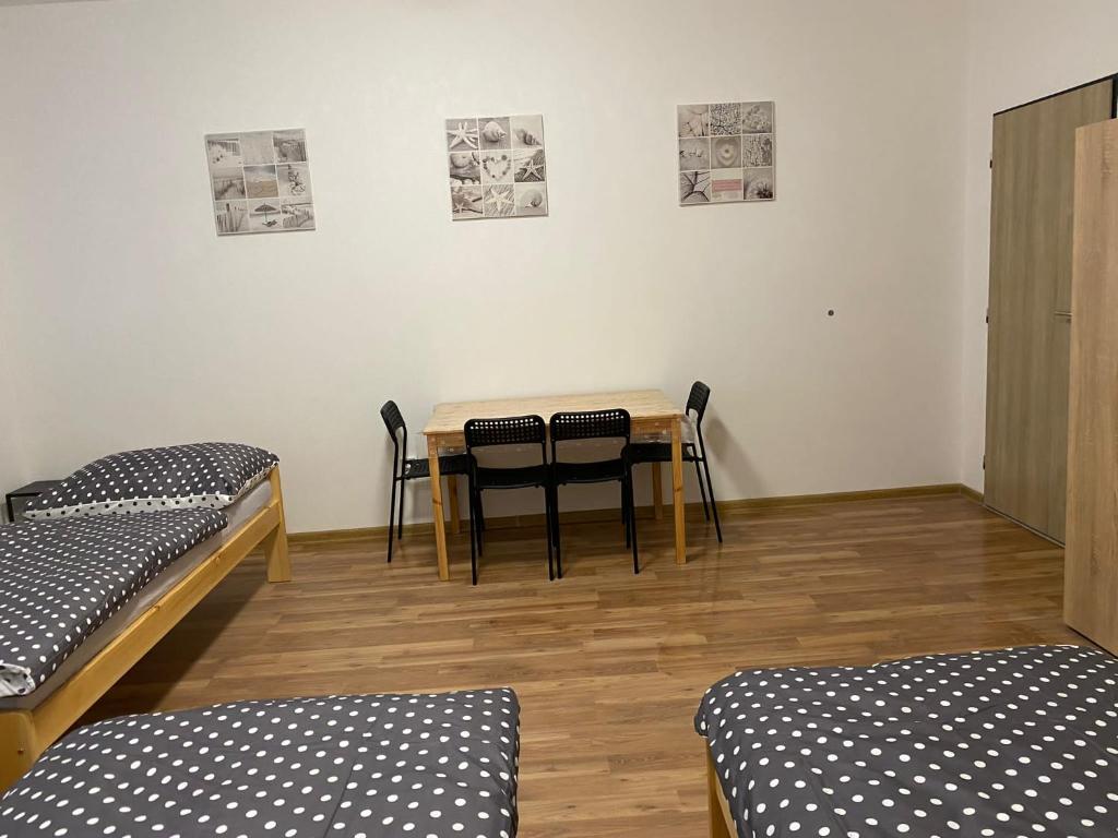 Postel nebo postele na pokoji v ubytování Apartmány Kortan