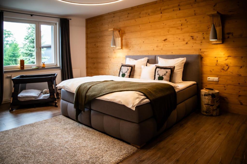 Postel nebo postele na pokoji v ubytování Landhaus Gebirgsglück