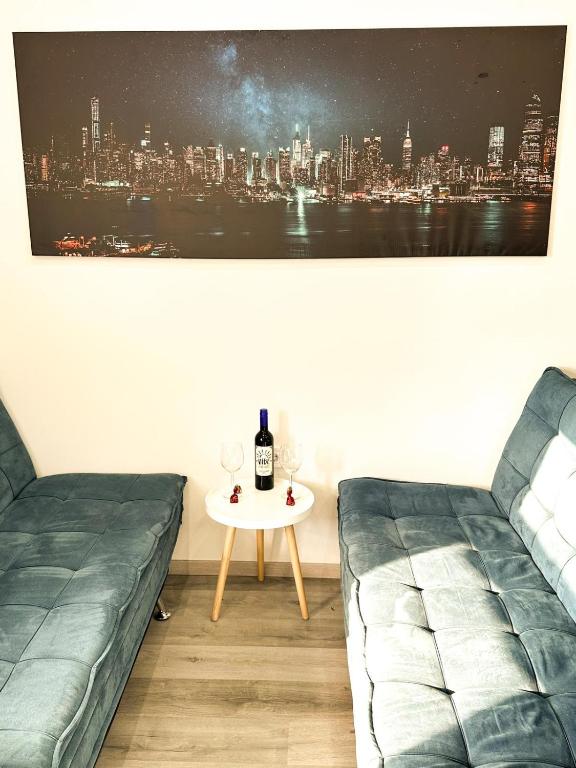 Uma área de estar em VIBE S32 Apartman,AC,Free Parking