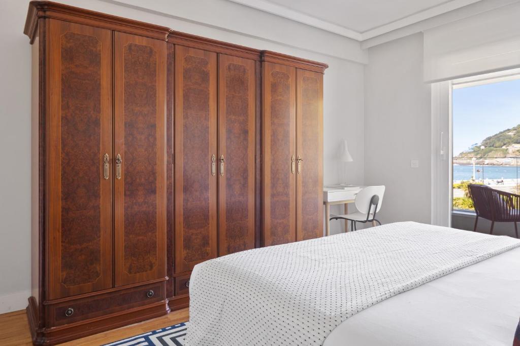 Łóżko lub łóżka w pokoju w obiekcie Palacio Miramar by FeelFree Rentals