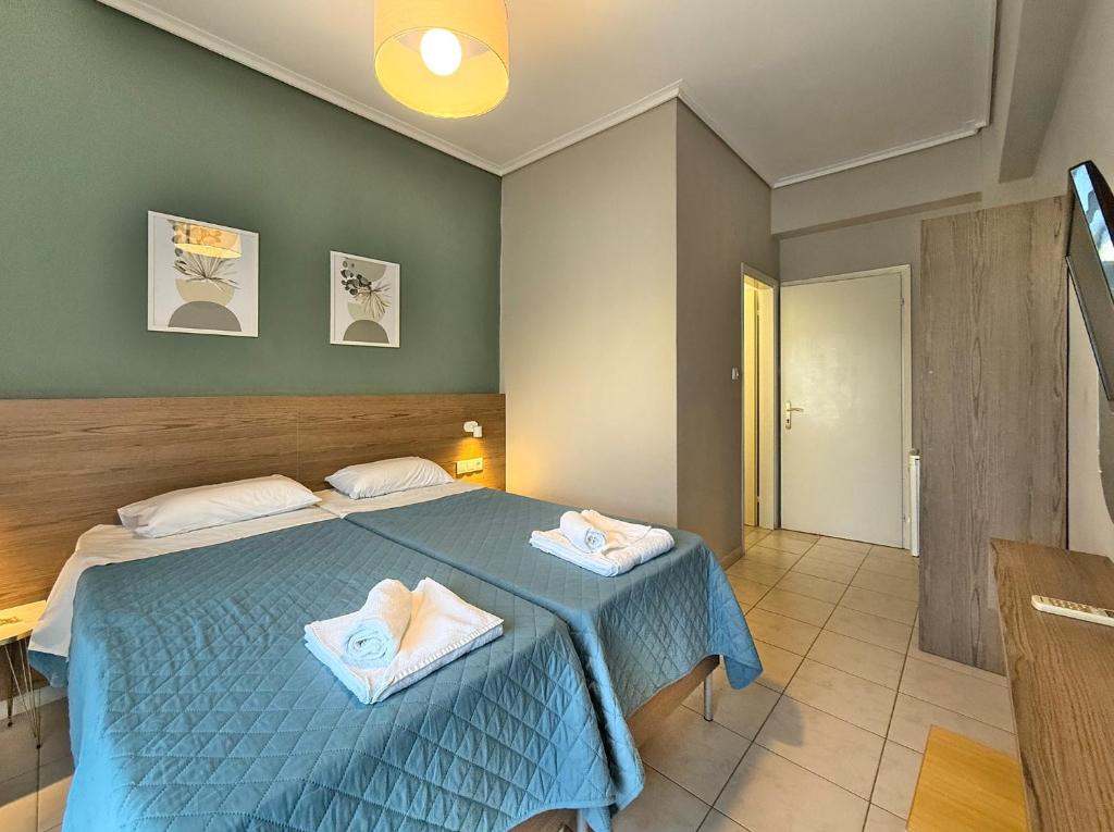 Postel nebo postele na pokoji v ubytování Hotel Thermaikos