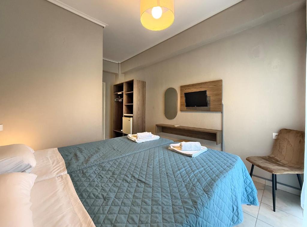 Postel nebo postele na pokoji v ubytování Hotel Thermaikos