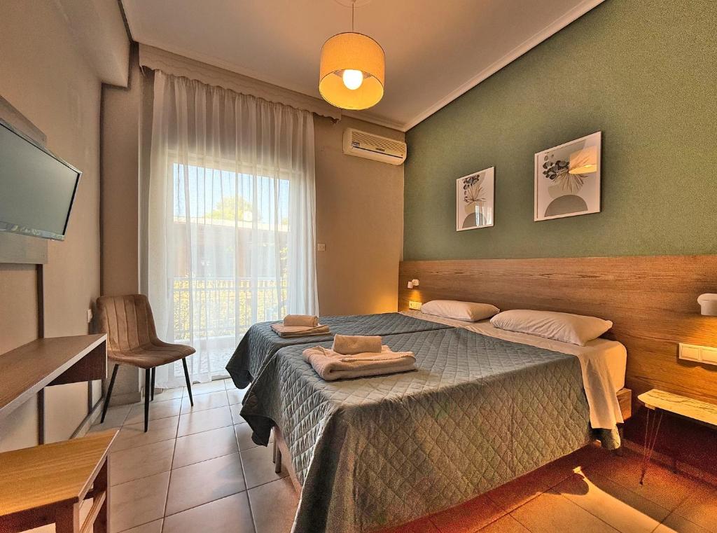 Postel nebo postele na pokoji v ubytování Hotel Thermaikos