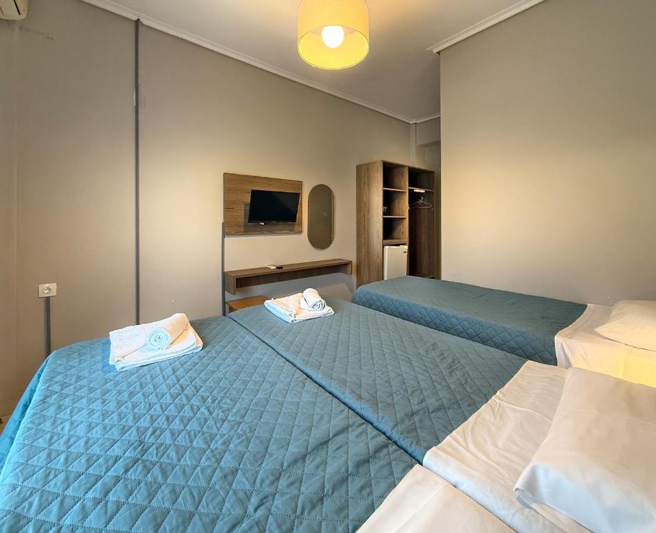 Postel nebo postele na pokoji v ubytování Hotel Thermaikos