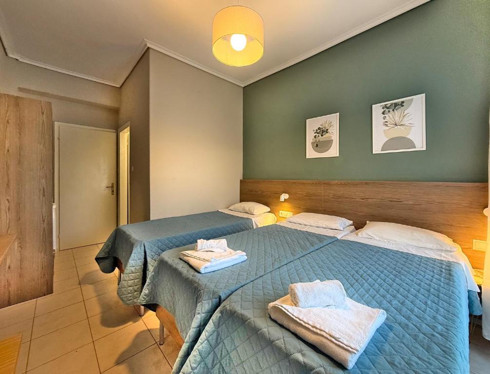 Postel nebo postele na pokoji v ubytování Hotel Thermaikos