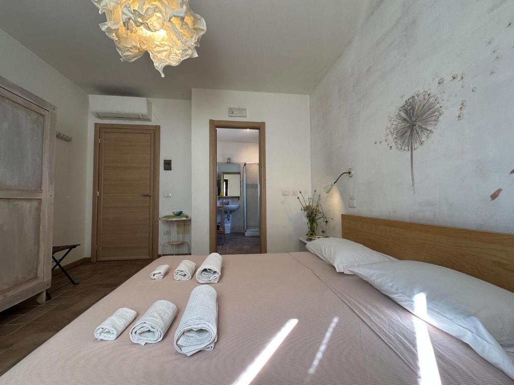 Postel nebo postele na pokoji v ubytování Conero Mare Verde