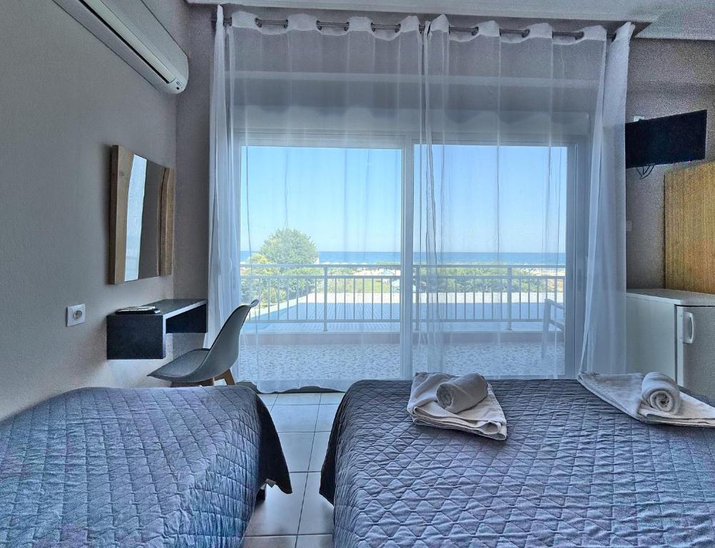 Postel nebo postele na pokoji v ubytování Hotel Thermaikos