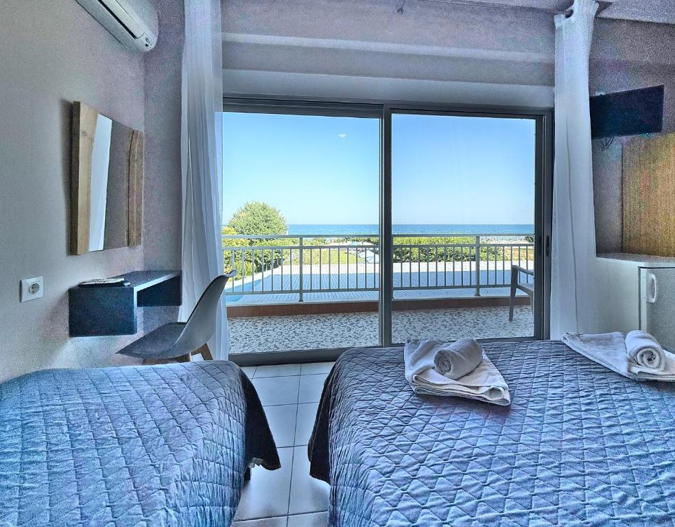Postel nebo postele na pokoji v ubytování Hotel Thermaikos