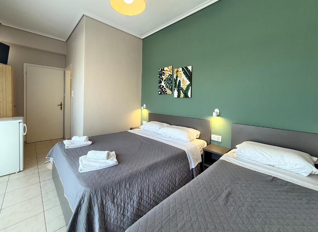 Postel nebo postele na pokoji v ubytování Hotel Thermaikos