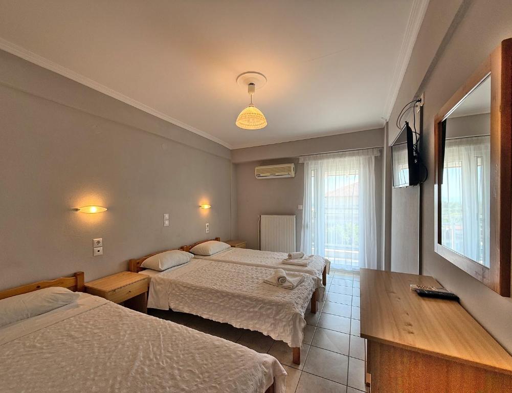 Postel nebo postele na pokoji v ubytování Hotel Thermaikos