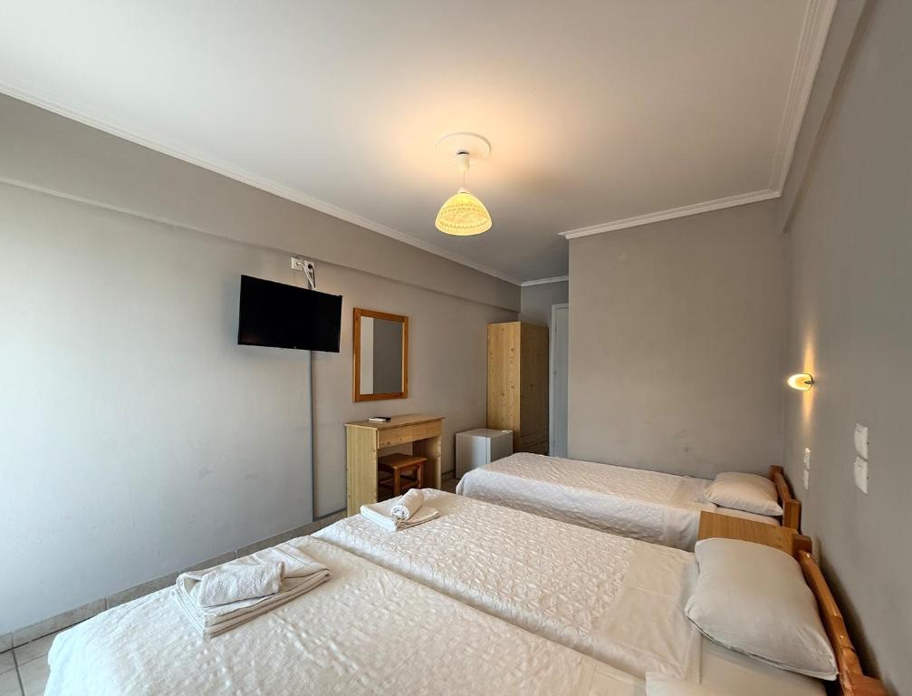 Postel nebo postele na pokoji v ubytování Hotel Thermaikos
