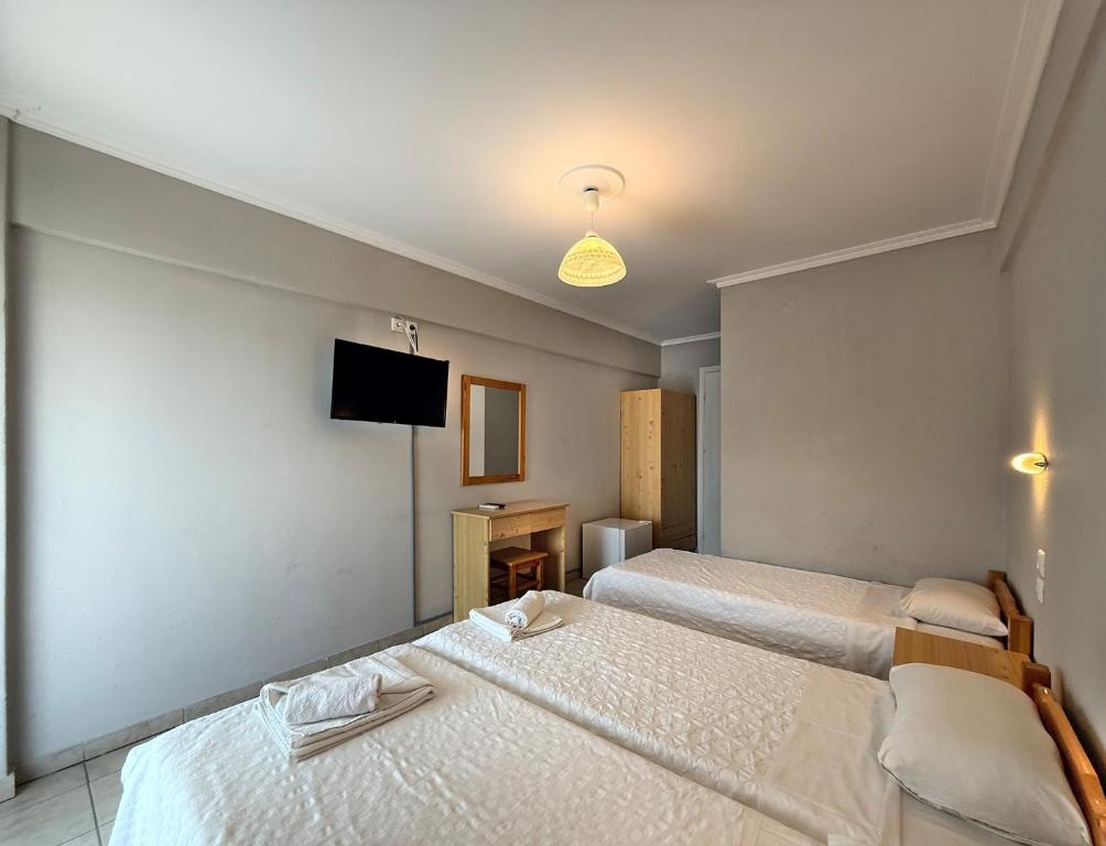 Postel nebo postele na pokoji v ubytování Hotel Thermaikos