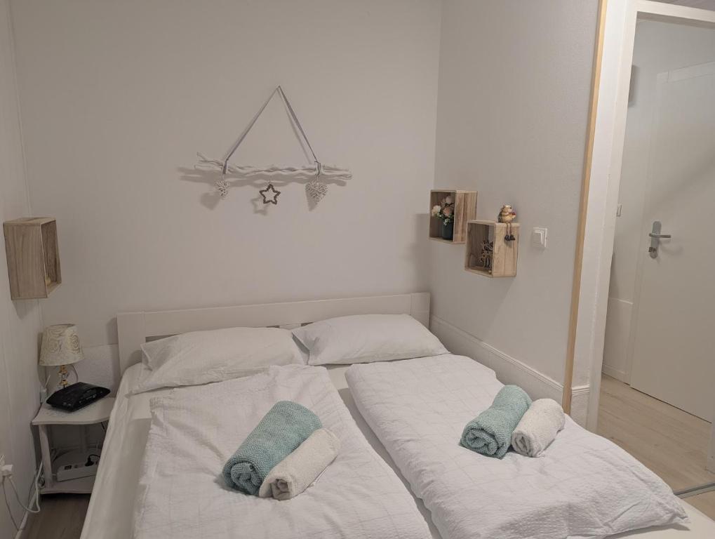 Postel nebo postele na pokoji v ubytování Apartment Lilija