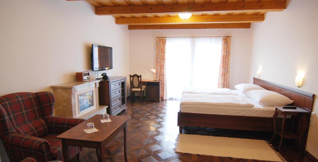 Postel nebo postele na pokoji v ubytování Hotel SHEYLYS