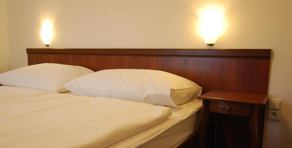Postel nebo postele na pokoji v ubytování Hotel SHEYLYS