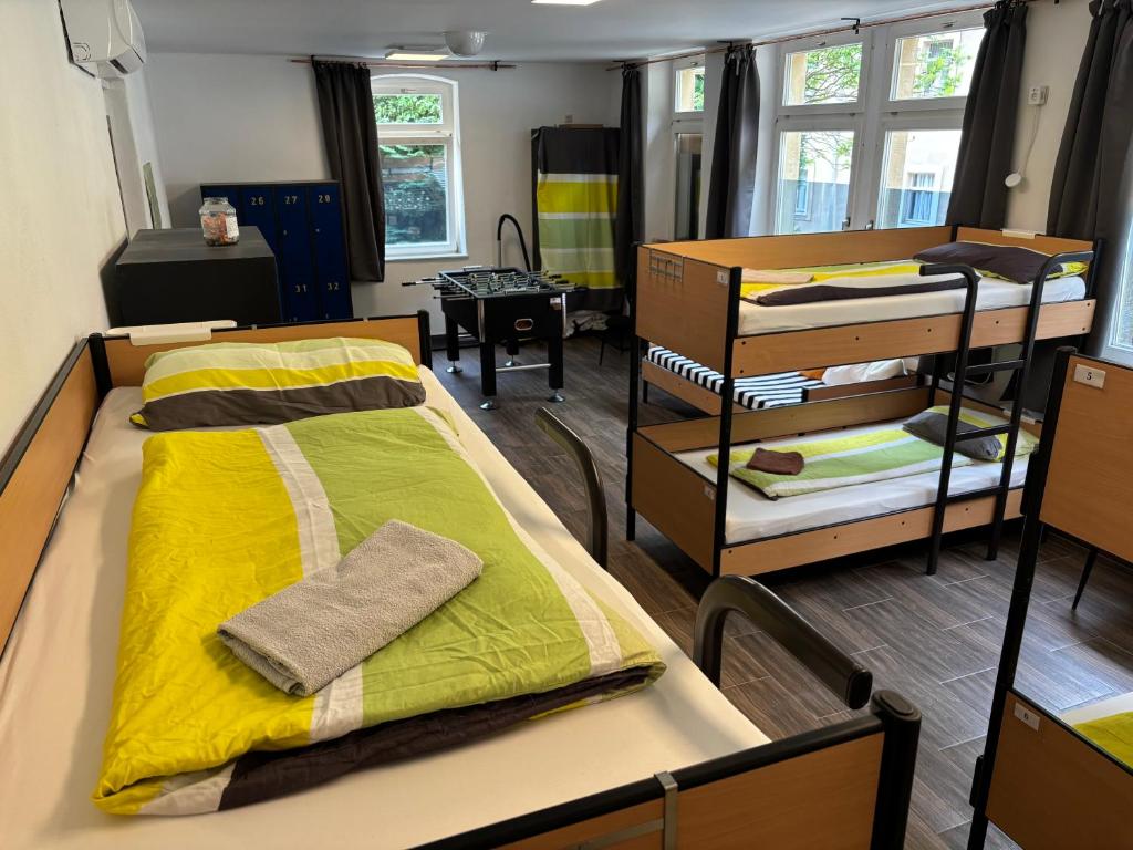 Postel nebo postele na pokoji v ubytování Alte Schule