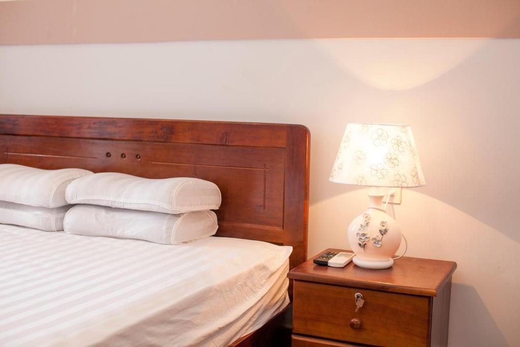 Giường trong phòng chung tại Phuong Nam Guest House
