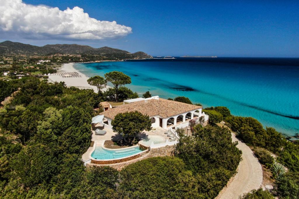 an aerial view of a house next to a beach at Villa Bianca in Villasimius