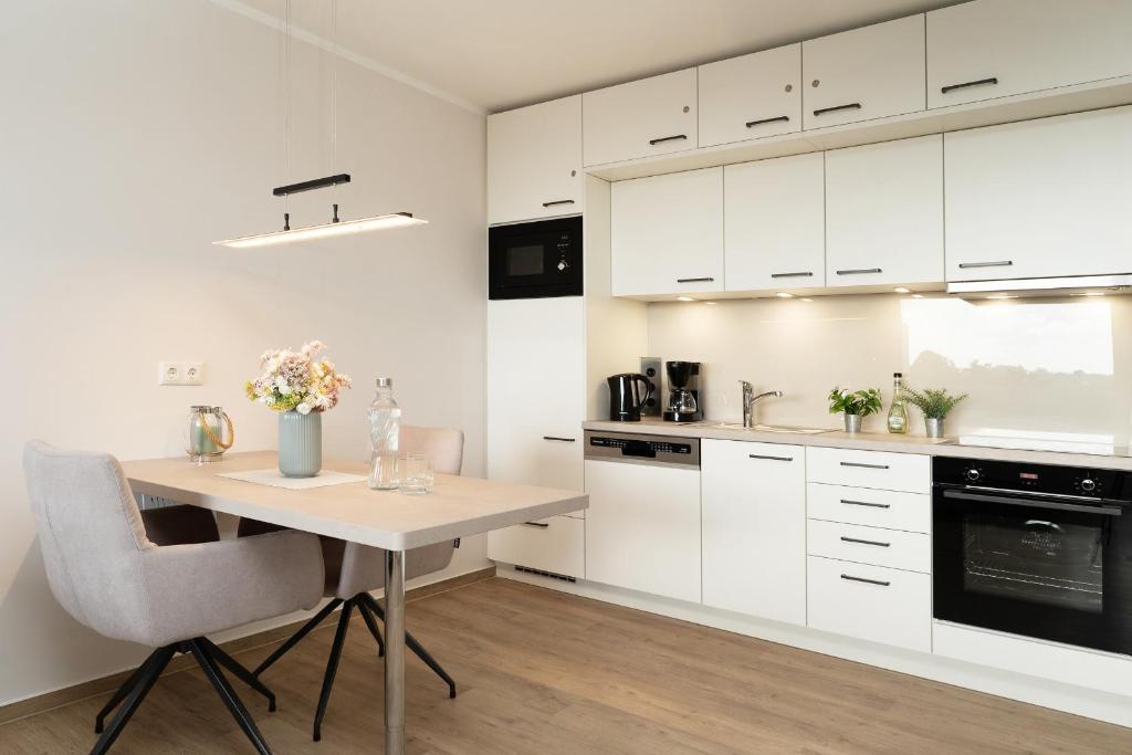 Kuchyň nebo kuchyňský kout v ubytování Driftberg 1 Wohnung 121