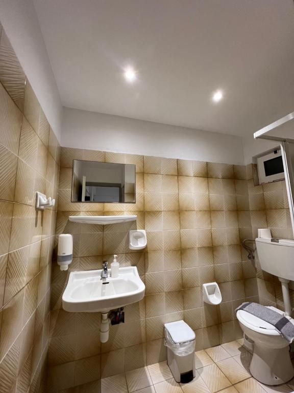 Koupelna v ubytování Mark Hotel