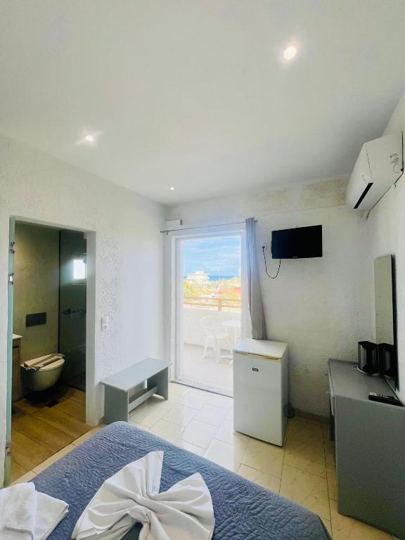 TV a/nebo společenská místnost v ubytování Mark Hotel