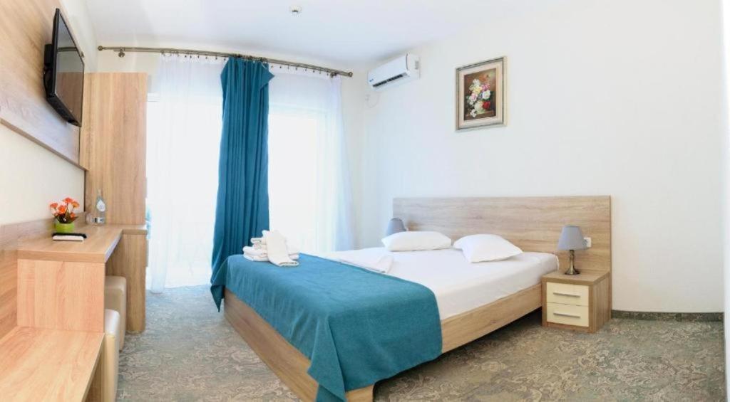 Postel nebo postele na pokoji v ubytování Hotel Union