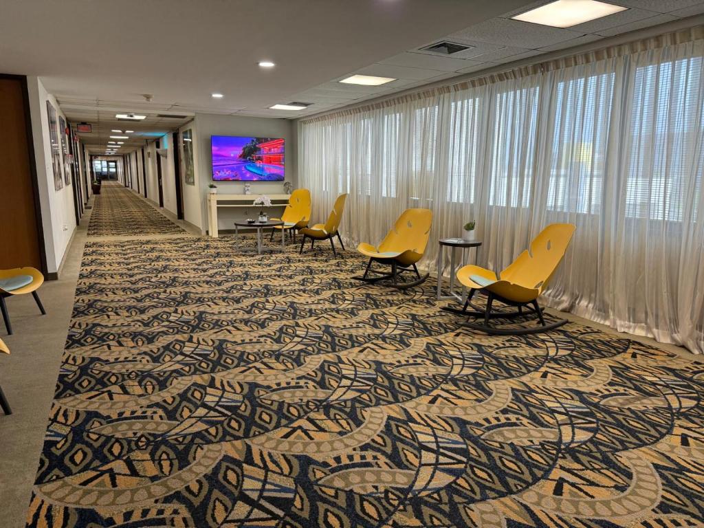 TV a/nebo společenská místnost v ubytování Ficus Hotel