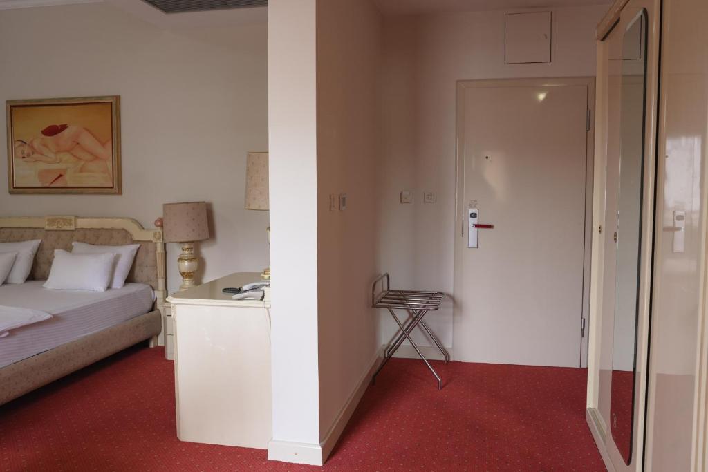 Postel nebo postele na pokoji v ubytování Hotel Radobolja