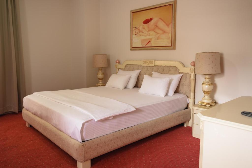 Postel nebo postele na pokoji v ubytování Hotel Radobolja