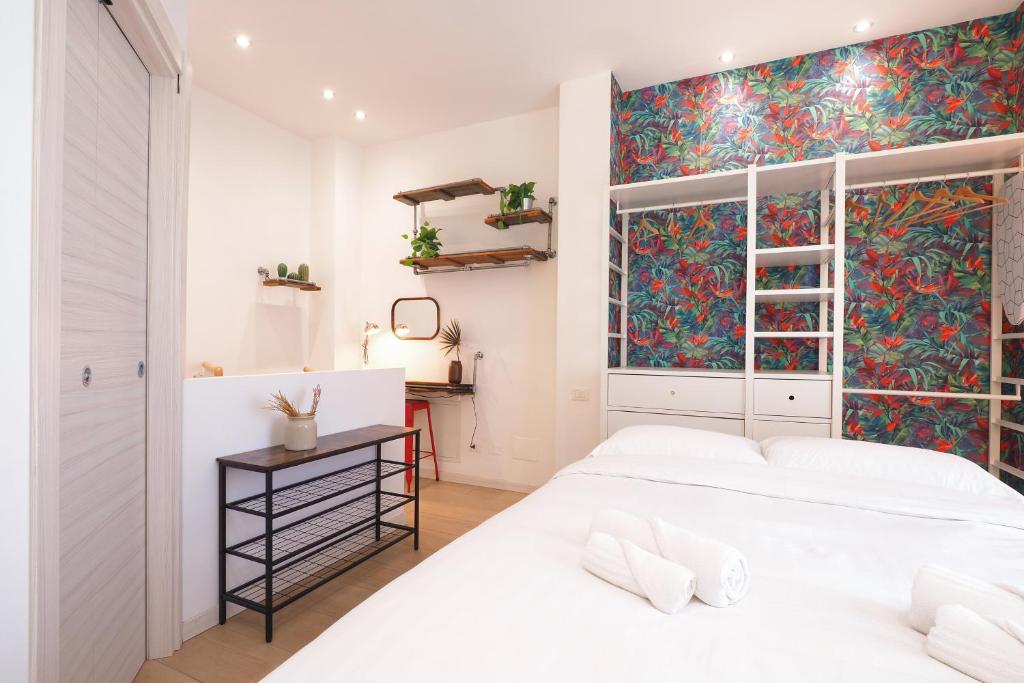 Postel nebo postele na pokoji v ubytování PrimoPiano - Rogoredo