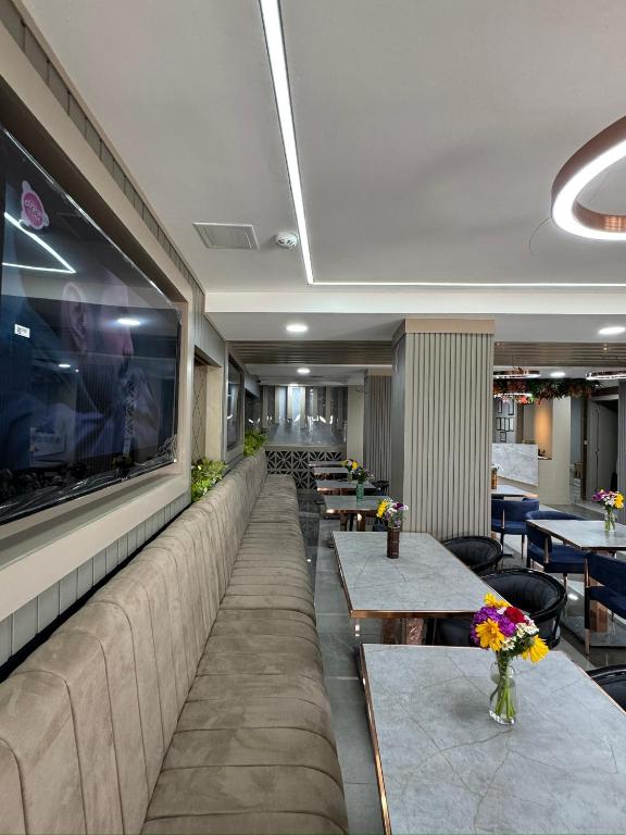 TV a/nebo společenská místnost v ubytování Best Nobel Hotel