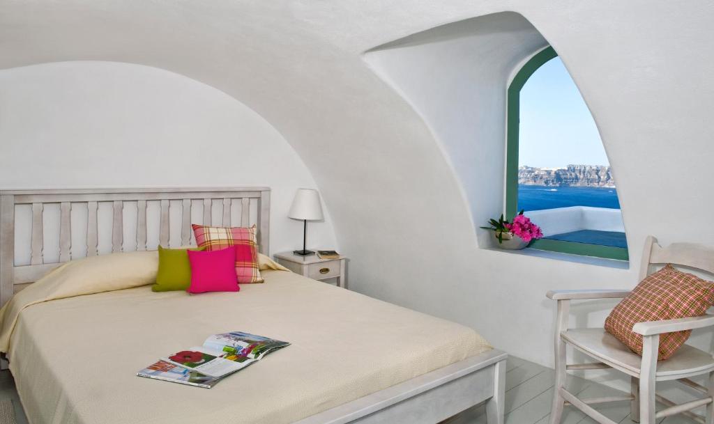 Postel nebo postele na pokoji v ubytování Aura Marina Apartments Santorini