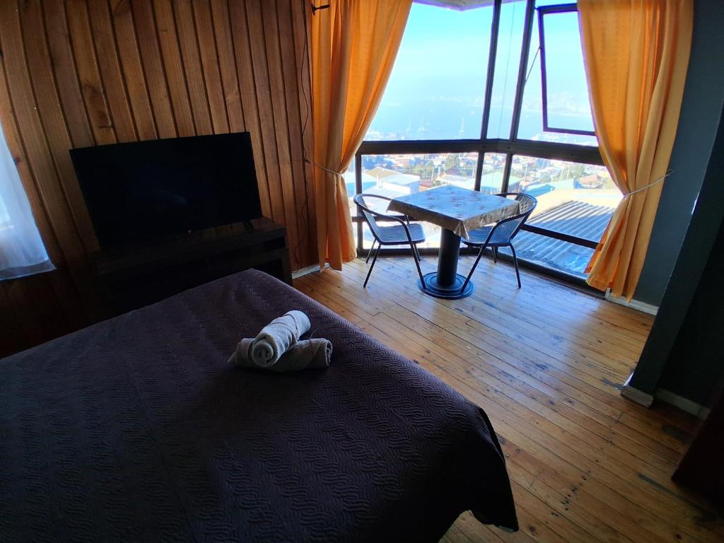 TV a/nebo společenská místnost v ubytování Hostal Casa Altavista