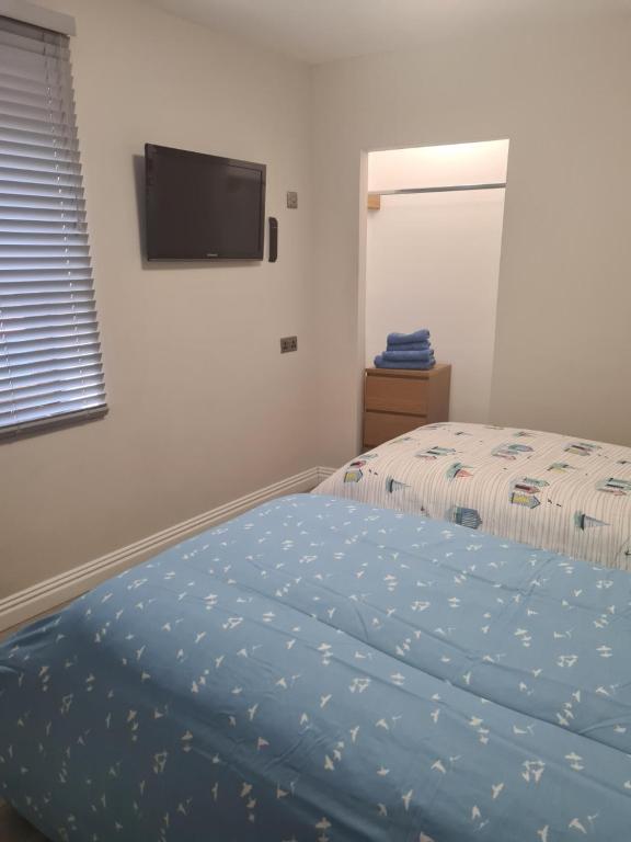 UlsterApartments one bedroom 2 single beds and sofa bed - Apartamento De Un Dormitorio