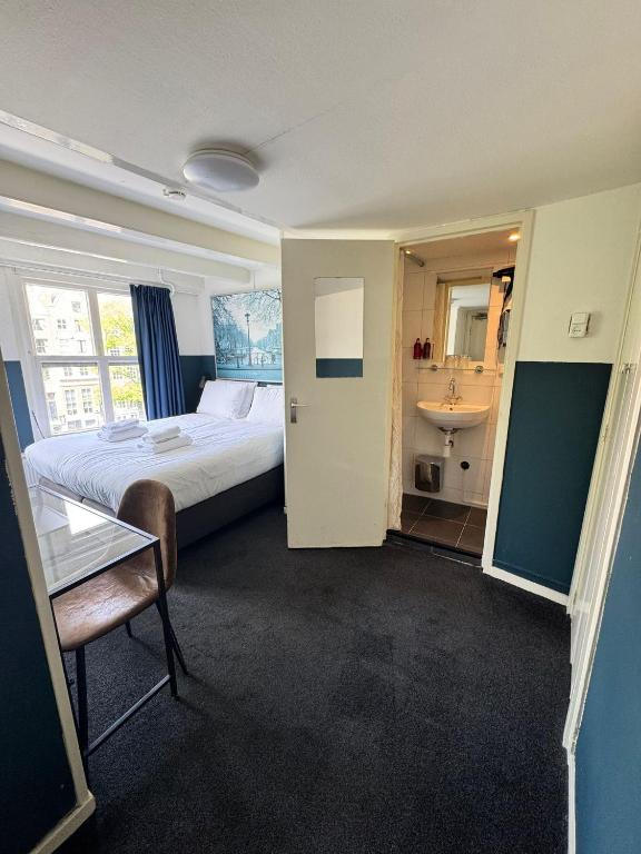 Ein Bett oder Betten in einem Zimmer der Unterkunft Hotel Hoksbergen
