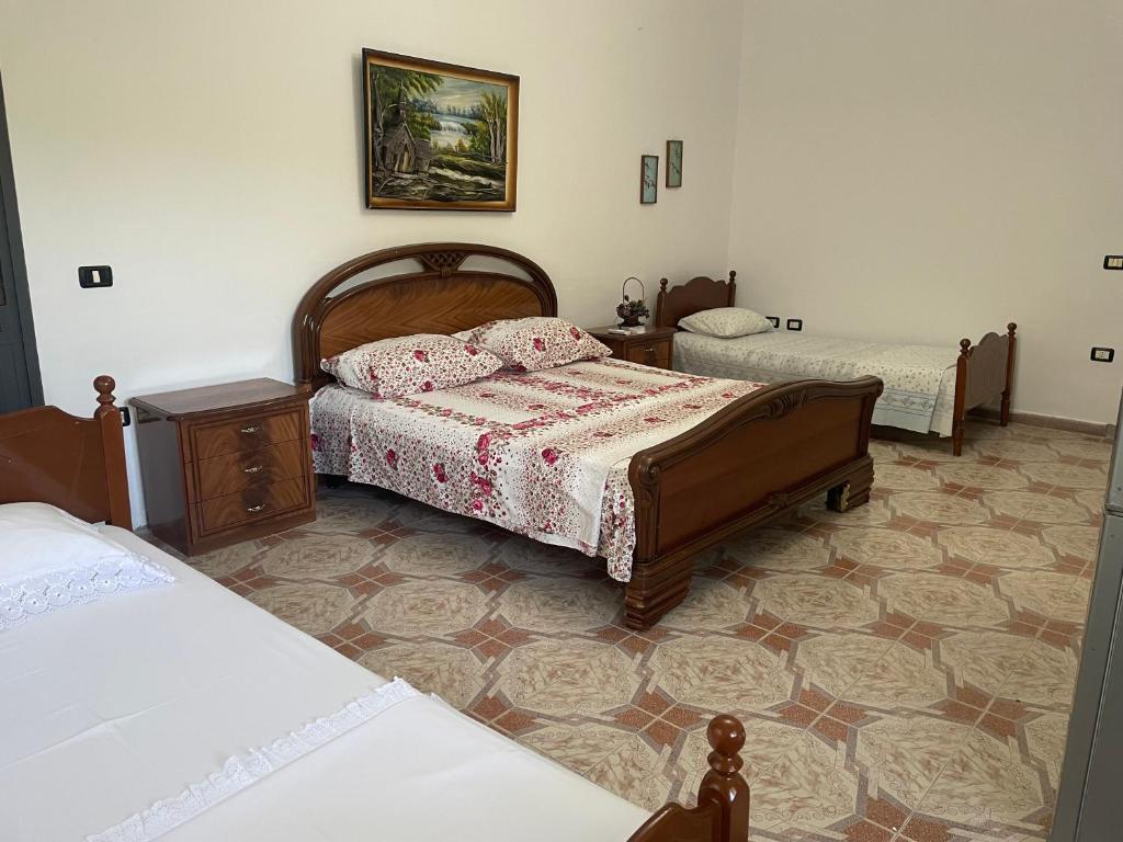 Letto o letti in una camera di Vila BriArt