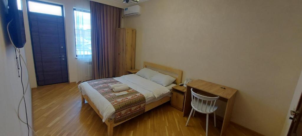Postel nebo postele na pokoji v ubytování Kenut Hostel