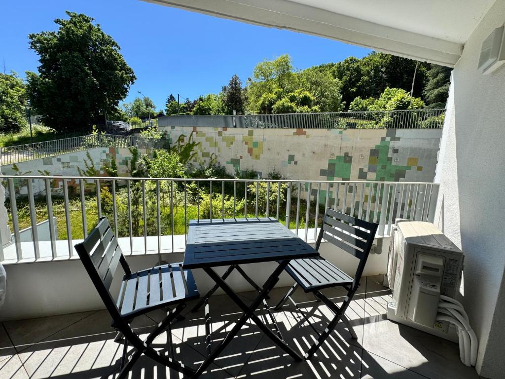 En balkon eller terrasse på Le Palmier