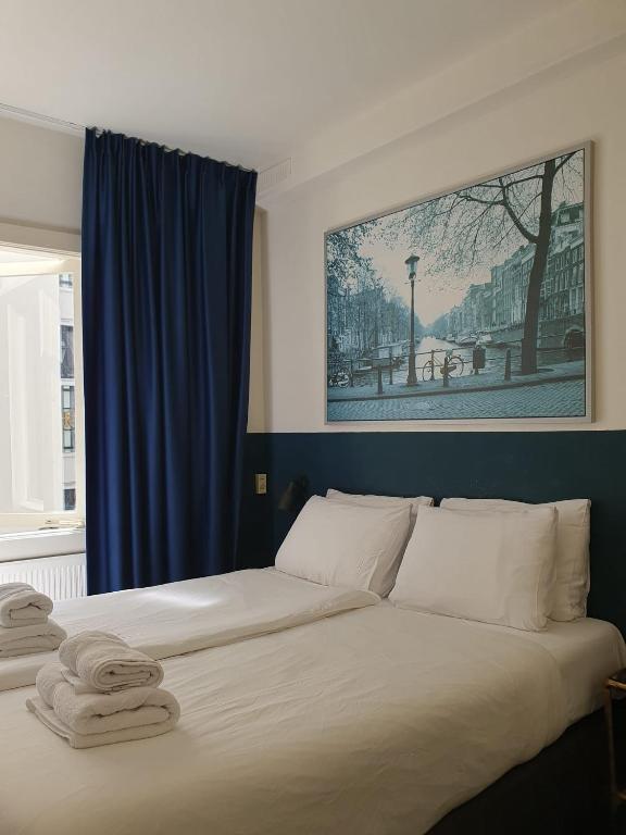 Ein Bett oder Betten in einem Zimmer der Unterkunft Hotel Hoksbergen