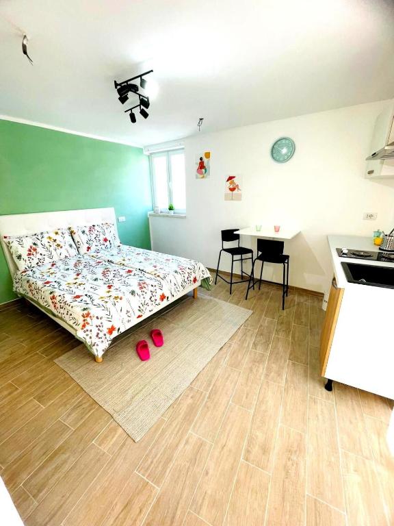Postel nebo postele na pokoji v ubytování Piccolo Amore