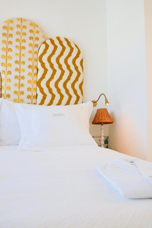 Posteľ alebo postele v izbe v ubytovaní Hotel Misiana Tarifa