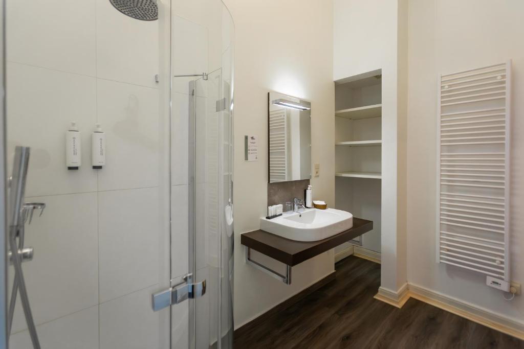 Koupelna v ubytování Hotel Orion
