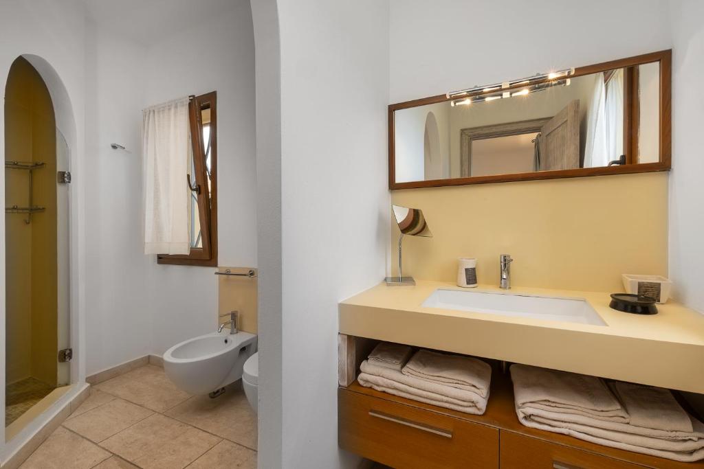 Koupelna v ubytování The Square Rooms and Suites