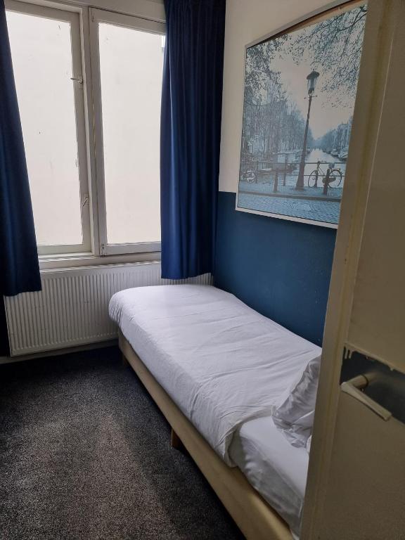 Ein Bett oder Betten in einem Zimmer der Unterkunft Hotel Hoksbergen