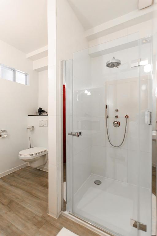 Koupelna v ubytování Hotel Orion