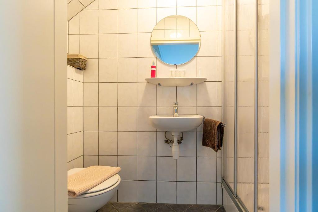 Koupelna v ubytování B&B Plompetorenzicht
