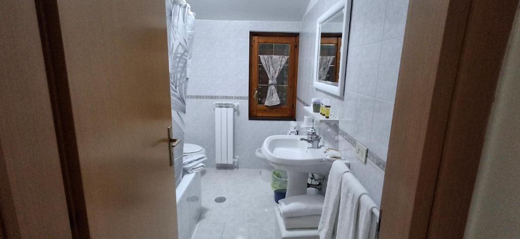 Koupelna v ubytování Hotel affittacamere novella