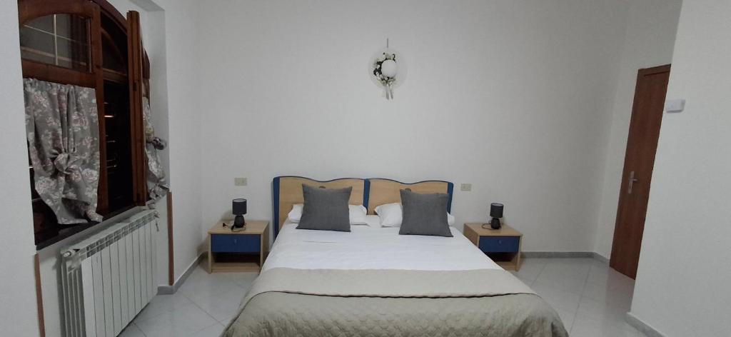 Postel nebo postele na pokoji v ubytování Hotel affittacamere novella
