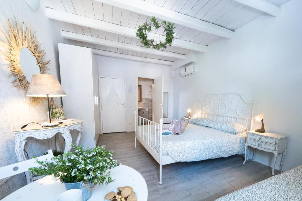 Postel nebo postele na pokoji v ubytování B&B A Portata di Mare
